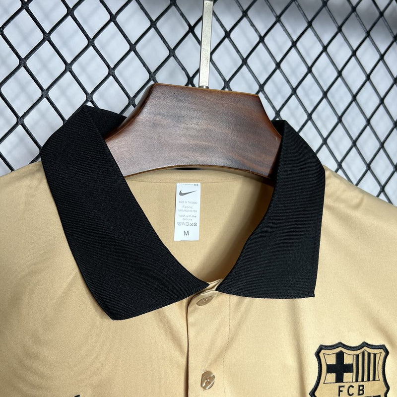 Camisa Barcelona Viagem Gold 24/25 - POLO